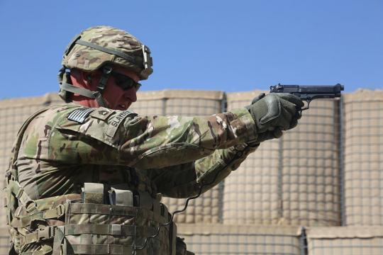 US military man firing a M9 Beretta pistol (Image credit - Chenee Brooks. Wikimedia Commons)