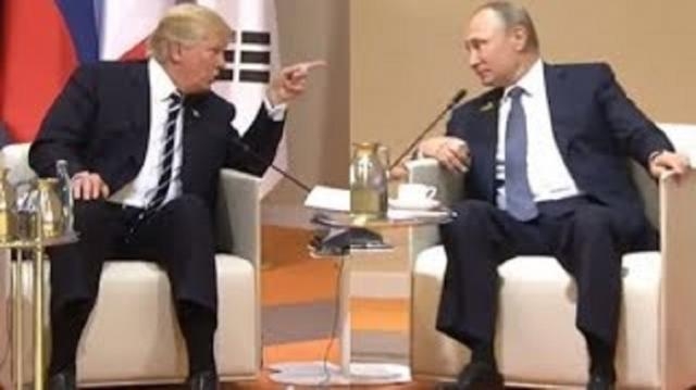 Trump and Putin at their first face-to-face meeting. (Image Credit: news672/YouTube)