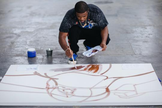 ASAP Ferg creating a painting for Hennessy (image use with permission of Hennessy)