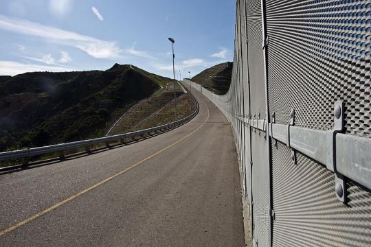 Border Fence near San Diego (Image credit - Josh Denmark, Wikimedia Commons)