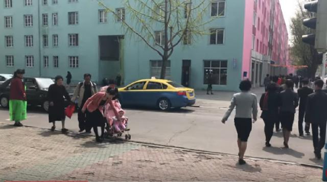 Scene of downtown Pyongyang. [Image source/Mihai Titienar YouTube video]