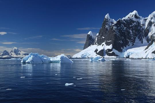 Melting glaciers in Lemaire Channel, Antarctica. - [Image Credit – Liam Quinn, Wikimedia Commons]
