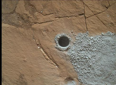 NASA's Curiosity Mars Rover drilled hole to collect sample material (Image credit: NASA/JPL-Caltech/MSSS, Wikimedia Commons)