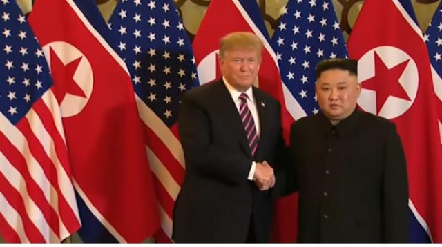 Donald Trump, Kim Jong Un shake hands at Hanoi summit. [Image source/Channel NewsAsia YouTube video]