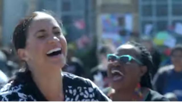 Meghan Markle tells girls to fight for gender equality. [Image source/Access YouTube video]