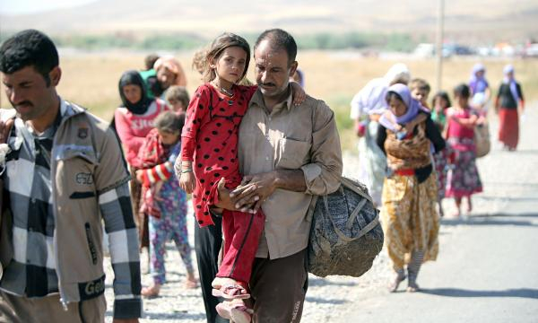 Migranti yazidi liberi da Daesh.